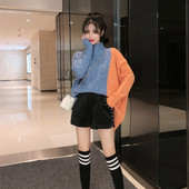 Női széles pulóver hasítékkal és pólógallérral