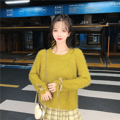 Női pehelypulóver, ujjain megkötős zöld és fekete színben