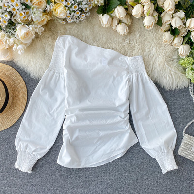 Γυναικεία casual μπλούζα με γυμνούς ώμους και μακριά μανίκια σε διαφορετικά χρώματα