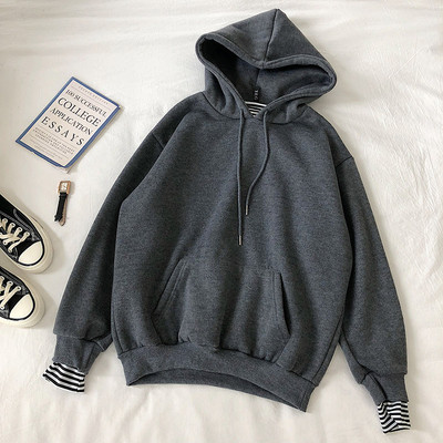 Casual γυναικείο πουλόβερ σε πέντε χρώματα με κορδόνια και  τσέπη