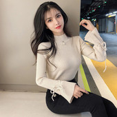 Γυναικείο ριγέ πουλόβερ με μανίκια σε διάφορα χρώματα