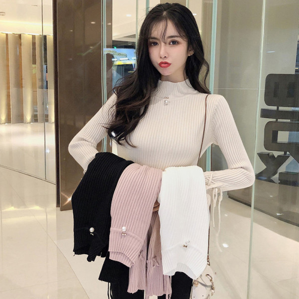 Γυναικείο ριγέ πουλόβερ με μανίκια σε διάφορα χρώματα