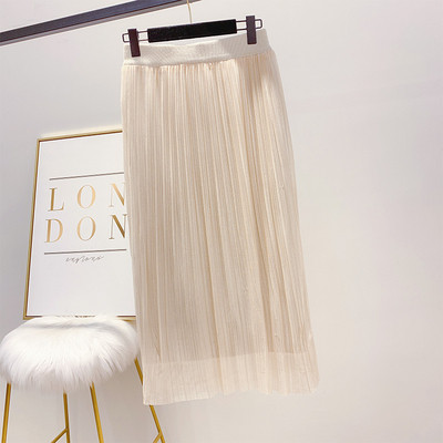 Modern, fényes hatású női szoknya fekete és bézs színben