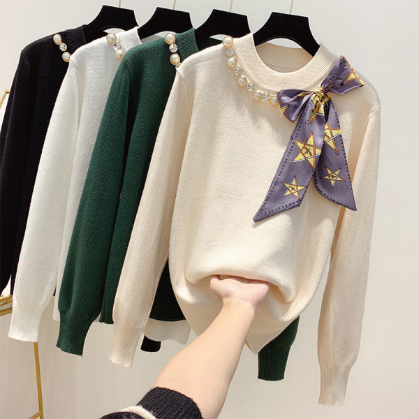 Κομψό γυναικείο πουλόβερ με κορδέλα και πέρλες σε τέσσερα χρώματα