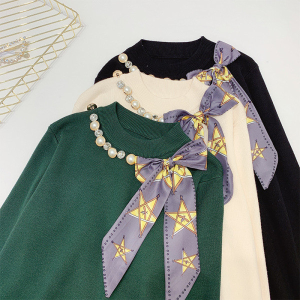 Κομψό γυναικείο πουλόβερ με κορδέλα και πέρλες σε τέσσερα χρώματα