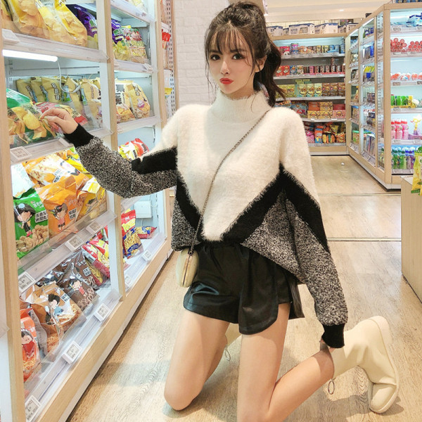 Γυναικείο χειμωνιάτικο πουλόβερ με ψηλό γιακά