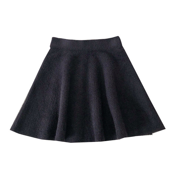 Alkalmi női szoknya fehér és fekete szabású mintával