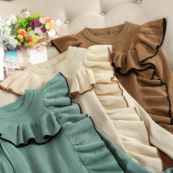 Modern női pulóver lótusz ujjakkal, kerek nyakkivágással több színben