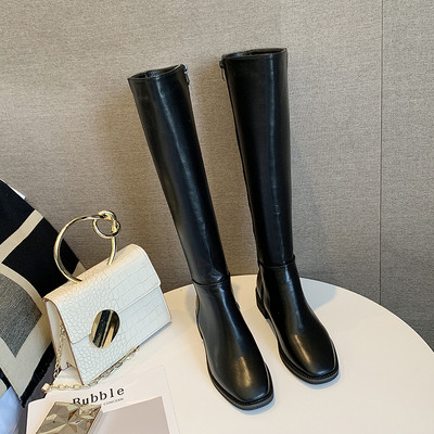 Γυναικείες ψηλές μπότες με φερμουάρ σε μαύρο και καφέ χρώμα