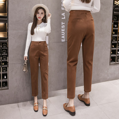 Μοντέρνο γυναικείο παντελόνι σε μαύρο και καφέ  χρώμα με ψηλή μέση