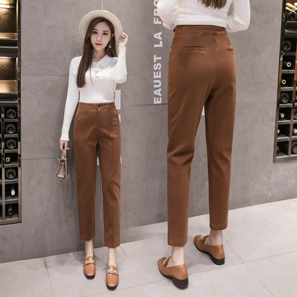 Μοντέρνο γυναικείο παντελόνι σε μαύρο και καφέ  χρώμα με ψηλή μέση