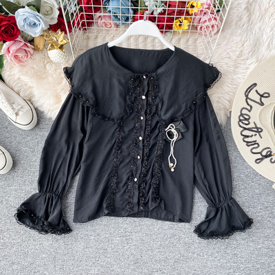 Modern női ing csipkével és fekete-fehér szalaggal