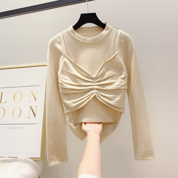 Modern női téli pulóver gyöngylánccal és kerek nyakkivágással