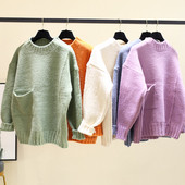 Γυναικεί χειμερινό πουλόβερ με τσέπες και στρογγυλη λαιμόκοψη