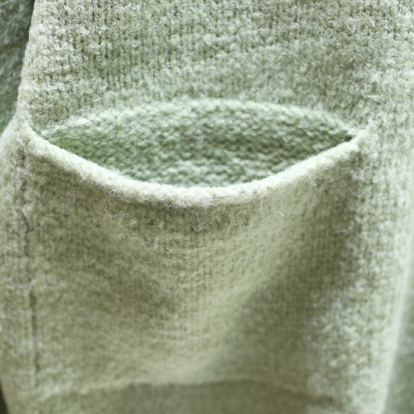 Γυναικεί χειμερινό πουλόβερ με τσέπες και στρογγυλη λαιμόκοψη