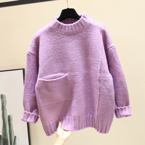 Γυναικεί χειμερινό πουλόβερ με τσέπες και στρογγυλη λαιμόκοψη