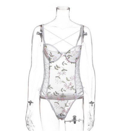 Κομψό γυναικείο κορμάκι με κεντήματα και κορδόνια σε λευκό χρώμα