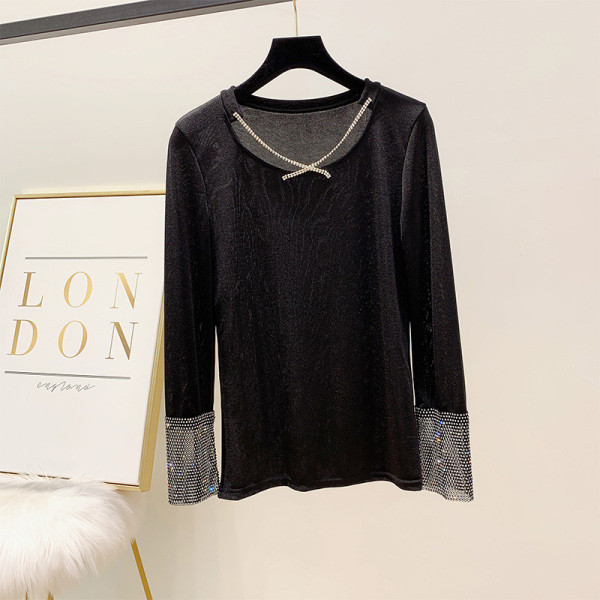 Κομψή, λεπτή γυναικεία μπλούζα  με διακοσμητικές πέτρες και μανίκια σε μαύρο χρώμα