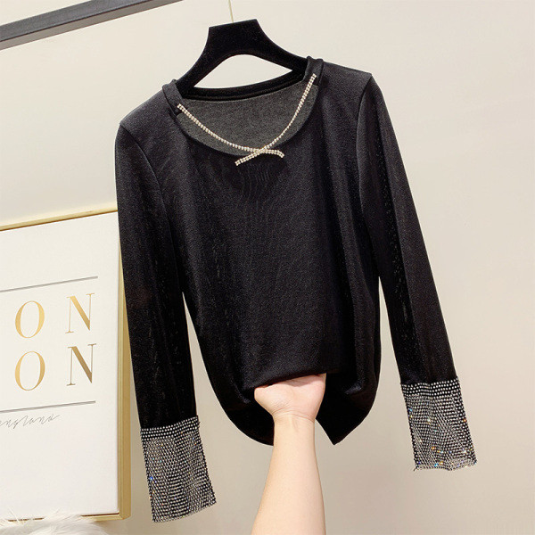 Κομψή, λεπτή γυναικεία μπλούζα  με διακοσμητικές πέτρες και μανίκια σε μαύρο χρώμα