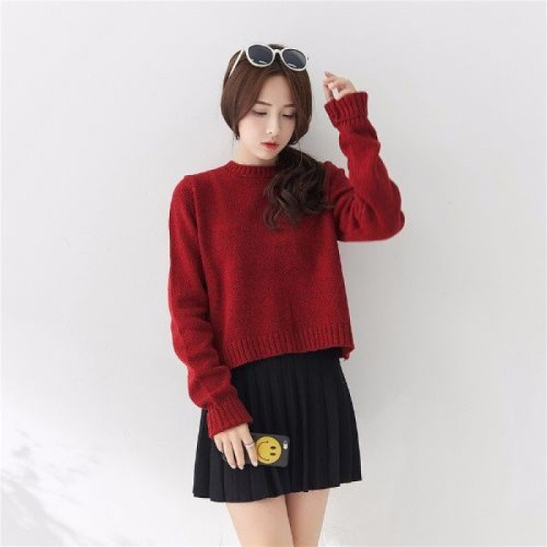 Kötött női pulóver kerek nyakkivágással, hátul nyakkendővel