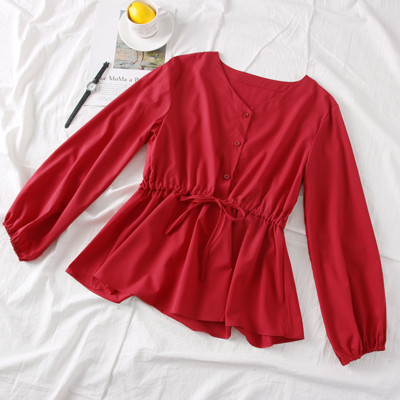 Modern női ing kerek nyakkivágással, gombokkal és megkötővel a derekán