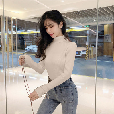 Γυναικείο πουλόβερ με ψηλό κολάρο και μεταλλικά στοιχεία στα  μανίκια