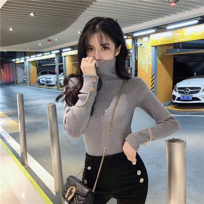 Γυναικείο πουλόβερ με ψηλό κολάρο και μεταλλικά στοιχεία στα  μανίκια