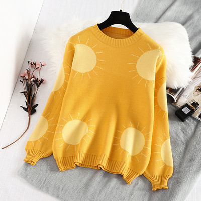 Γυναικείο μοντέρνο πουλόβερ με στρογγυλη λαιμόκοψη και μακρύ μανίκι σε κίτρινο χρώμα