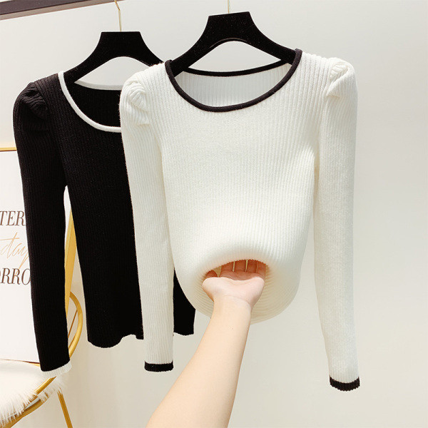 Vékony kötésből készült női pulóver puffos ujjakkal, fehér és fekete színben