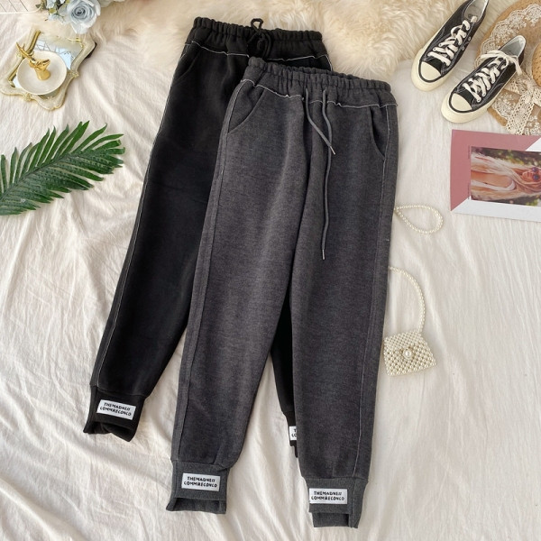 Női sportnadrág nyakkendővel és mintával három színben