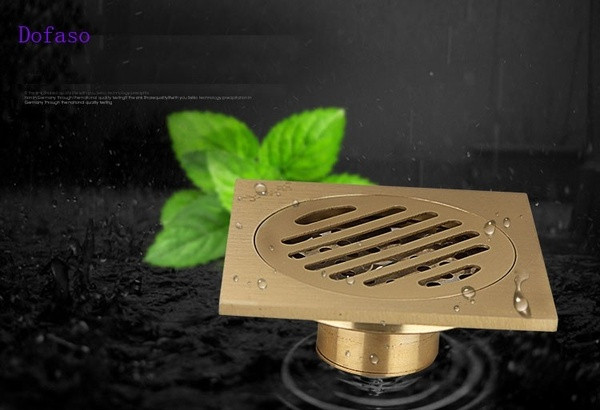 Sifon de podea de cupru de 10 cm potrivit pentru o baie patrata in culoarea aurie