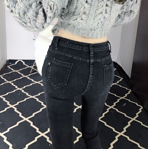 Blugi de damă cu motive rupte de culoare închisă