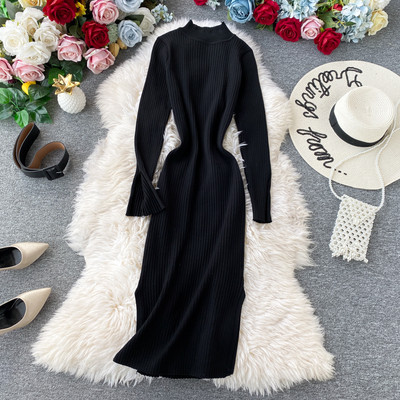 Női lezser hosszú kötött ruha hasítékkal és hosszú ujjú fekete és sárga színben