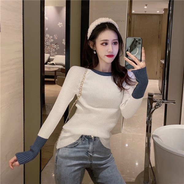 Női őszi-téli pulóver kerek nyakkivágással, testhezálló modellel