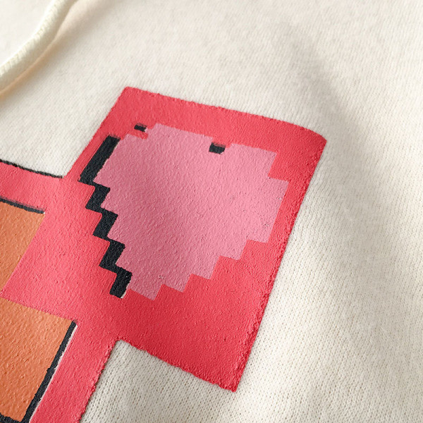 Napi női pulóver rátéttel és 3D elemekkel