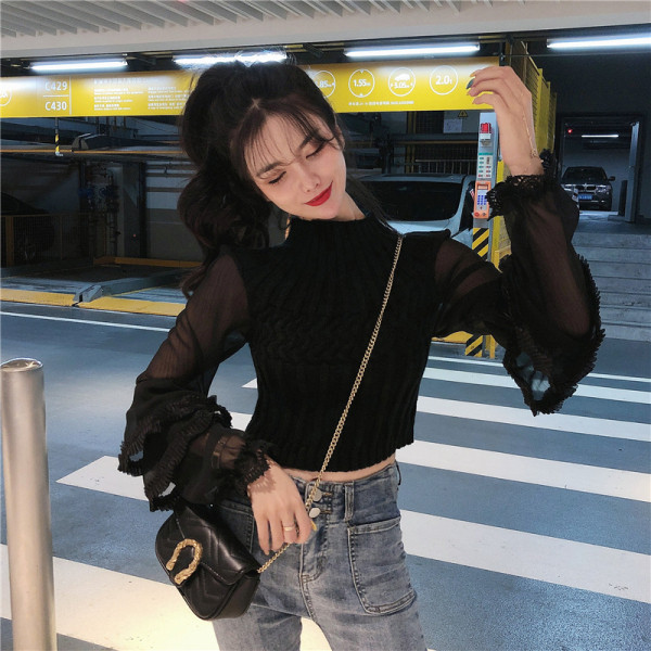 Aktuális női blúz magas pólógallérral és lótusz ujjakkal