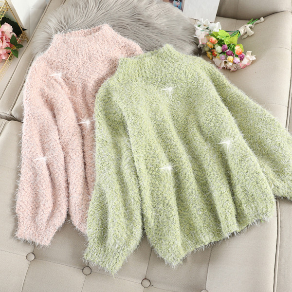 Modern női pulóver magas gallérral és hosszú ujjal