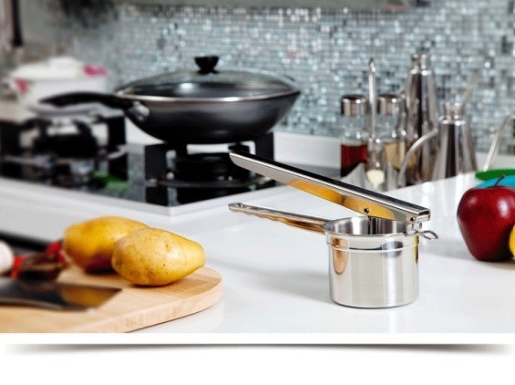 Rozsdamentes acél konyhai készülék zöldségek és gyümölcsök préselésére