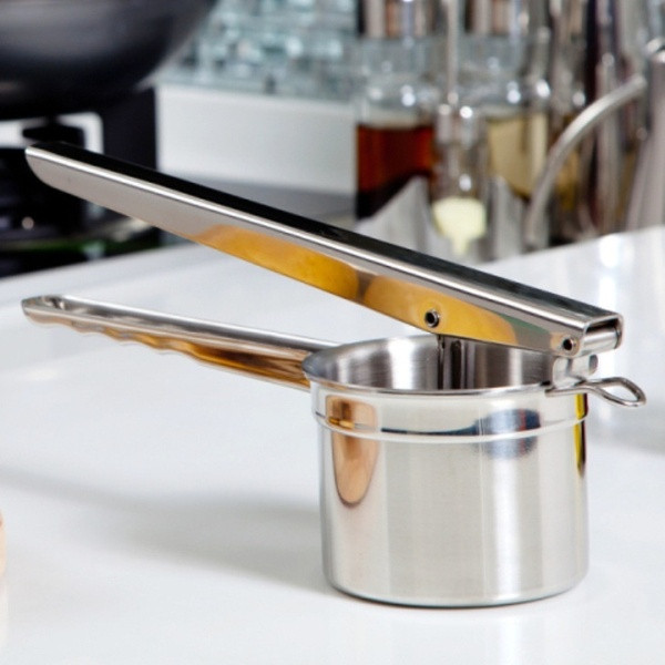 Rozsdamentes acél konyhai készülék zöldségek és gyümölcsök préselésére