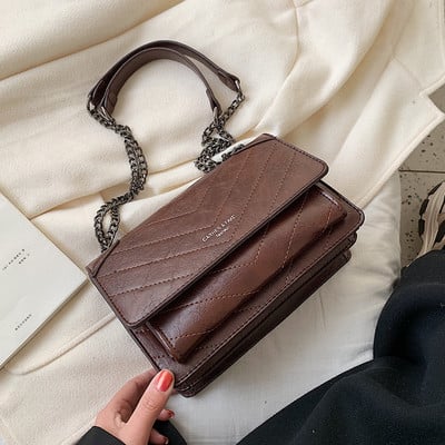 Geanta de dama moderna din piele ecologica cu lant in rosu, maro si negru