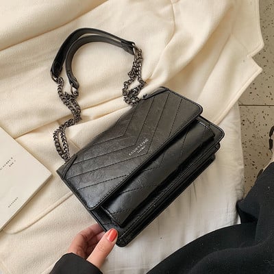 Geanta de dama moderna din piele ecologica cu lant in rosu, maro si negru