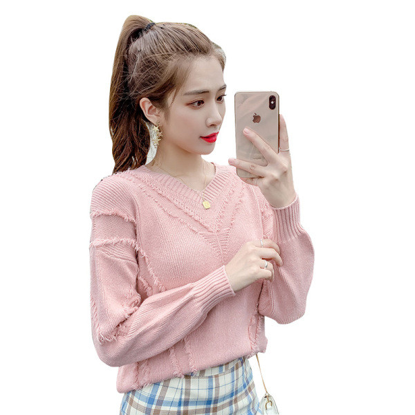 Modern női pulóver fehér és rózsaszín színben, V-nyakkal