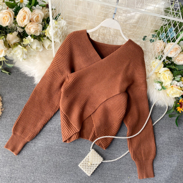 V-nyakú női pulóver rózsaszín, barna, bézs és fekete színben