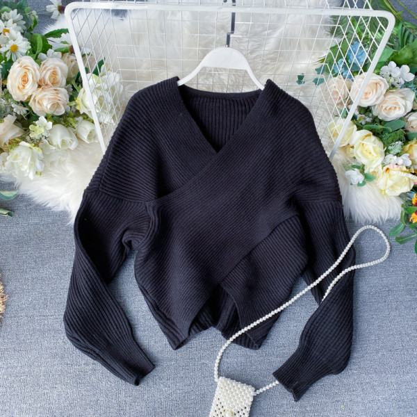 V-nyakú női pulóver rózsaszín, barna, bézs és fekete színben