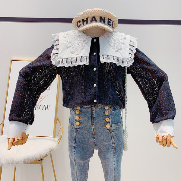 Női csipke ing fehér és fekete gombokkal