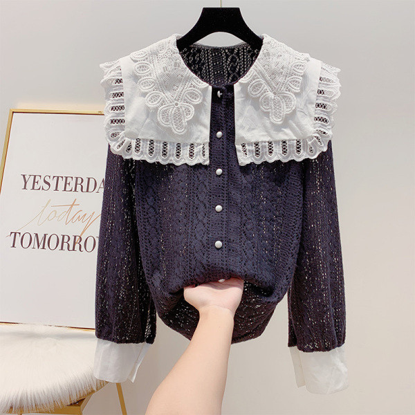 Női csipke ing fehér és fekete gombokkal