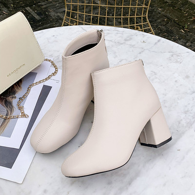 Γυναικείες έκο δερμάτινες-χειμωνιάτικες μπότες με χοντρό τακούνι σε μαύρο και άσπρο - δύο μοντέλα