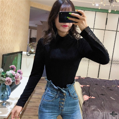 Őszi-téli női bársony blúz kövekkel fekete színben