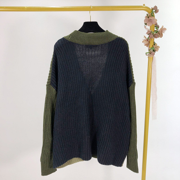 Hosszú, hétköznapi mellény zöld gombokkal és zsebekkel