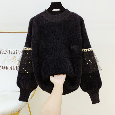 Női pehely pulóver tüll elemmel fehér és fekete színben - széles modell